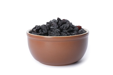 Bowl with dried dark raisins isolated on white. Healthy nutrition with fruits