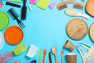Flat lay composition with household goods on light blue background, space for text. Recycling concept