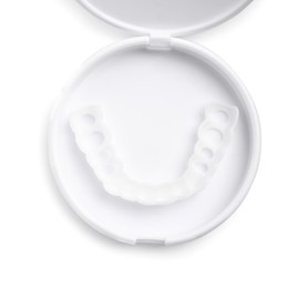 Photo of Dental mouth guard in container on white background, top view. Bite correction