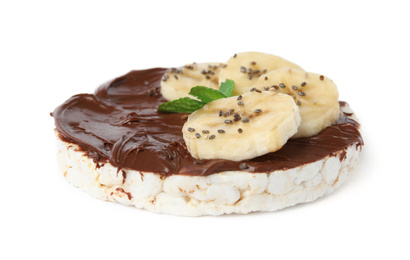 Puffed rice cake with chocolate spread, banana and mint isolated on white