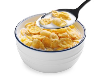 Spoon of delicious crispy corn flakes with milk above bowl on white background