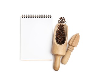 Blank recipe book, spices and wooden utensils on white background, top view. Space for text