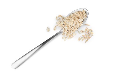 Raw oatmeal and spoon on white background, top view