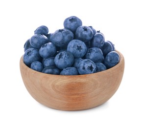 Tasty fresh ripe blueberries in wooden bowl on white background