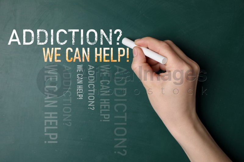 Alcohol addiction? - We can help you. Closeup view of woman writing on chalkboard