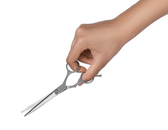 Hairdresser holding professional scissors isolated on white, closeup. Haircut tool