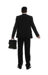 Photo of Businessman with suitcase on white background, back view