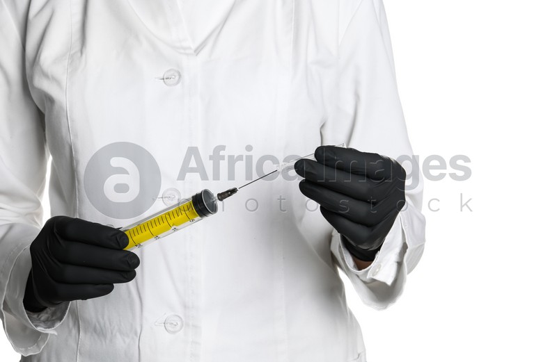 Doctor in medical gloves holding empty syringe on white background