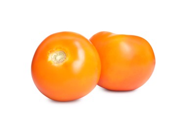 Fresh ripe yellow tomatoes on white background