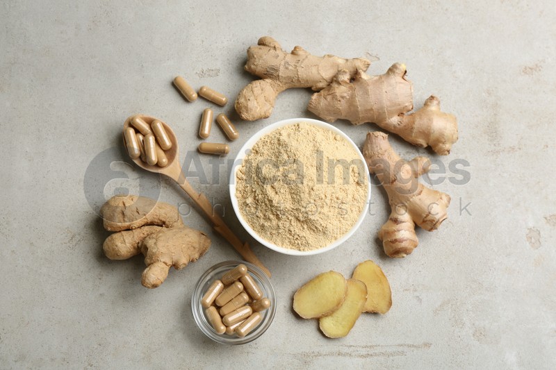 Photo of Flat lay composition with fresh and dry ginger on light grey table