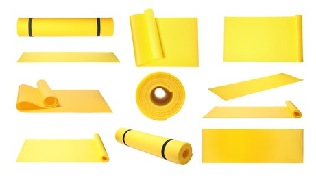 Set with yellow camping mats on white background 