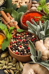 Photo of Different fresh herbs and spices as background, closeup
