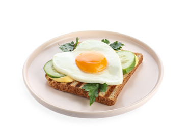 Plate of tasty sandwich with heart shaped fried egg isolated on white