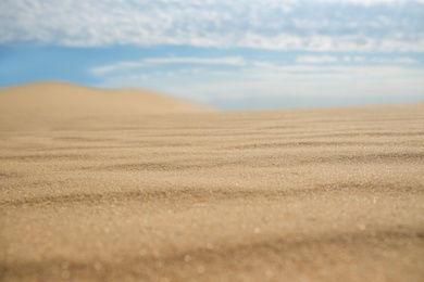 Dry sand in desert on sunny day