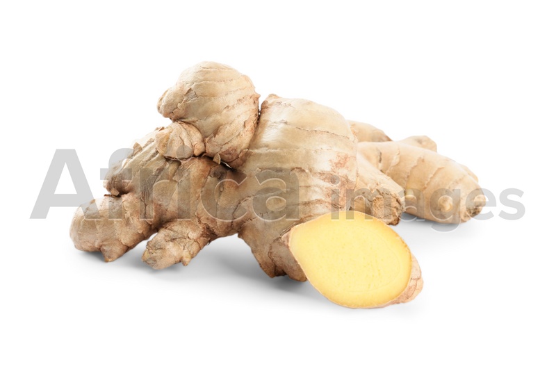 Photo of Whole and cut fresh ginger isolated on white