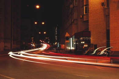 Photo of Beautiful view of city street with light trail at night