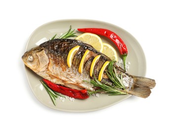 Tasty homemade roasted crucian carp with rosemary on white background, top view. River fish