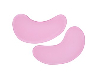 Pink under eye patches on white background, top view. Cosmetic product