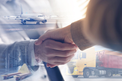 Multiple exposure of business partners shaking hands and different different transports. Logistics