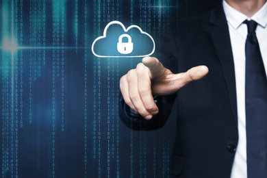 Cyber security concept. Businessman touching cloud with padlock illustration, closeup