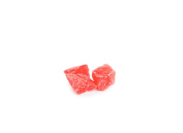 Delicious red candied fruit pieces on white background