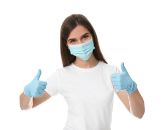 Female volunteer in mask and gloves on white background. Protective measures during coronavirus quarantine