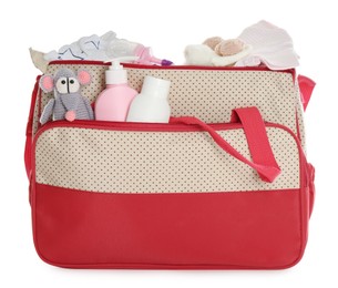Photo of Mother's bag with baby's stuff isolated on white