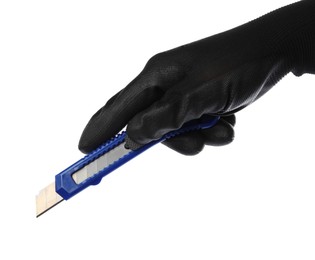Worker holding utility knife on white background, closeup