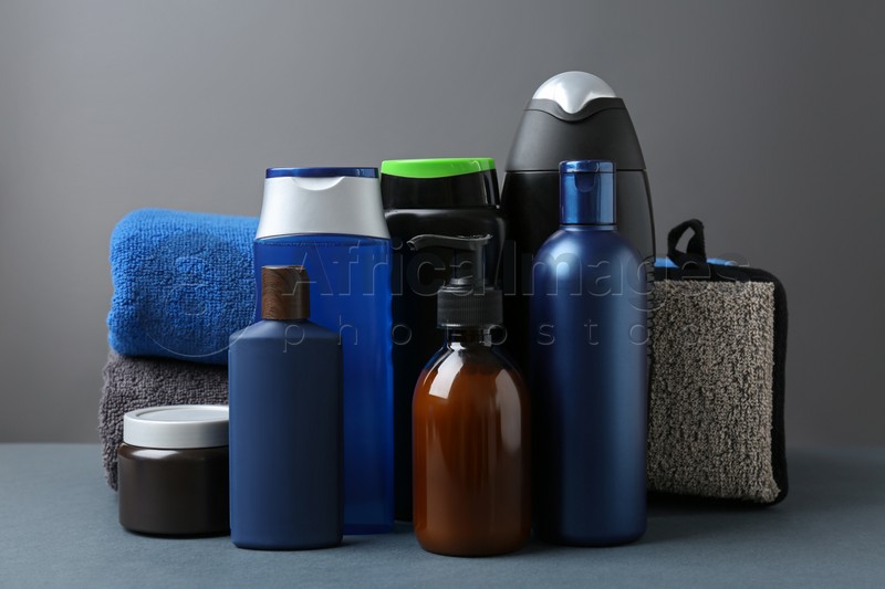 Set with men's personal hygiene products on grey table