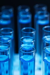 Test tubes with blue reagents, closeup. Laboratory analysis