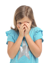 Photo of Scared little girl wearing casual outfit on white background