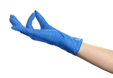 Woman in blue latex gloves holding something on white background, closeup of hand