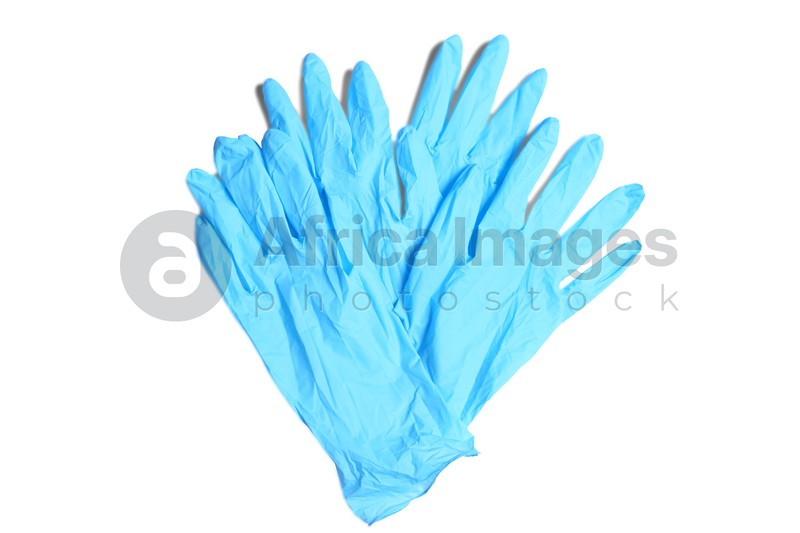 Medical gloves on white background, top view