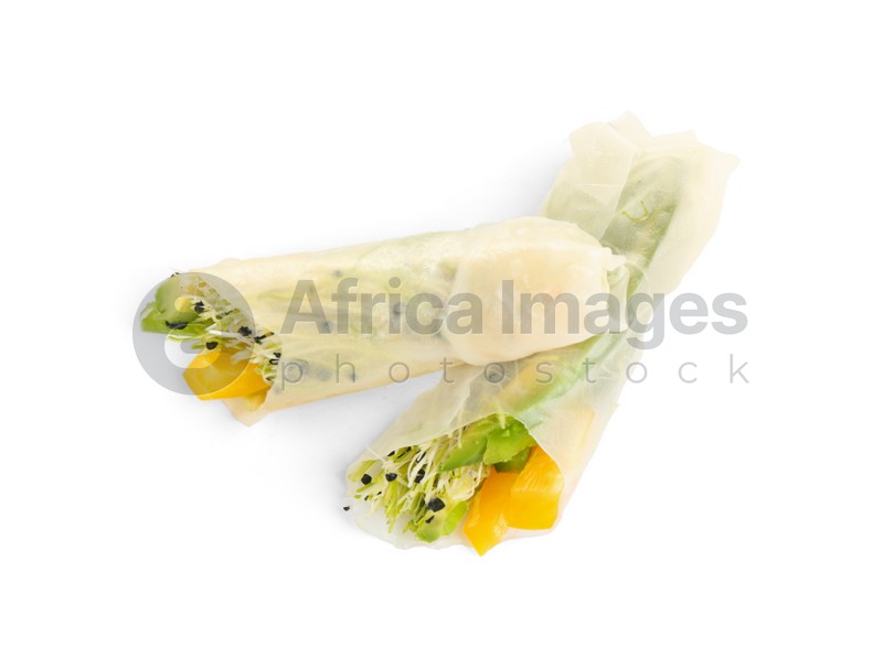 Delicious rolls wrapped in rice paper isolated on white, top view