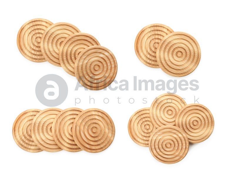 Set with stylish wooden cup coasters on white background, top view