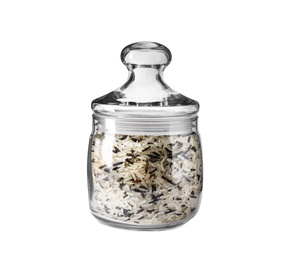Mix of brown and polished rice in jar isolated on white