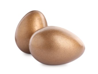 Two golden eggs on white background. Pension concept