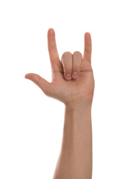 Man showing rock gesture against white background, closeup of hand
