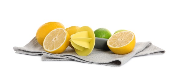 Plastic juicer, fresh lime and lemons on white background
