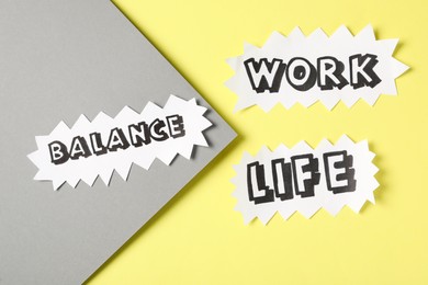 Paper sheets with words Work, Balance, Life on color background, flat lay