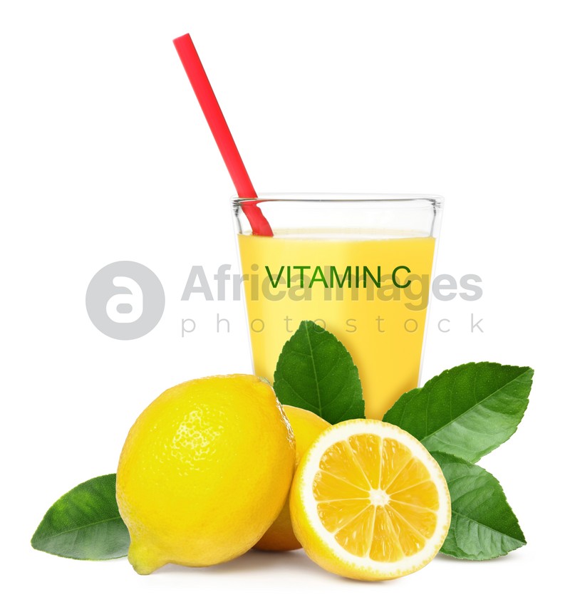 Source of Vitamin C. Glass of lemon juice, fresh fruits and green leaves on white background