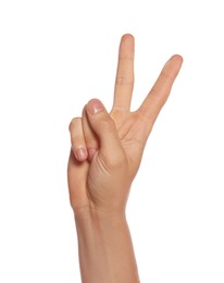 Man showing victory gesture on white background, closeup