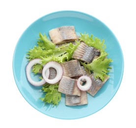 Blue plate with delicious salted herring slices, lettuce and onion rings isolated on white, top view