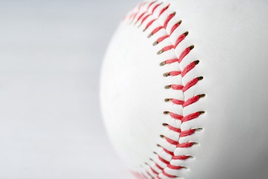 Photo of Closeup view of baseball ball, space for text. Sportive equipment