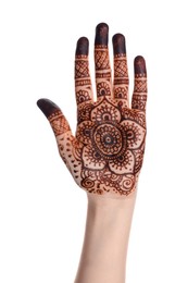 Woman with henna tattoo on palm against white background, closeup. Traditional mehndi ornament