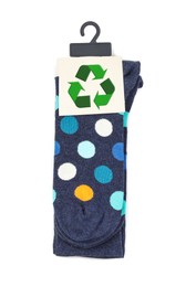 Colorful socks with recycling label on white background, top view