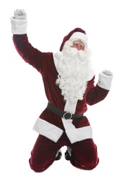 Joyful Santa Claus standing on knees against white background