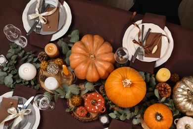 Beautiful autumn place setting and decor on table, flat lay