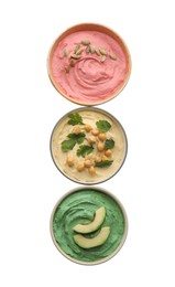 Different kinds of tasty hummus in bowls on white background, top view