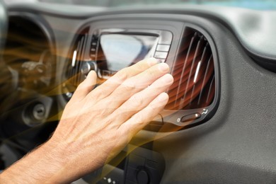 Man checking work of conditioner in car and illustration of warm air flow, closeup